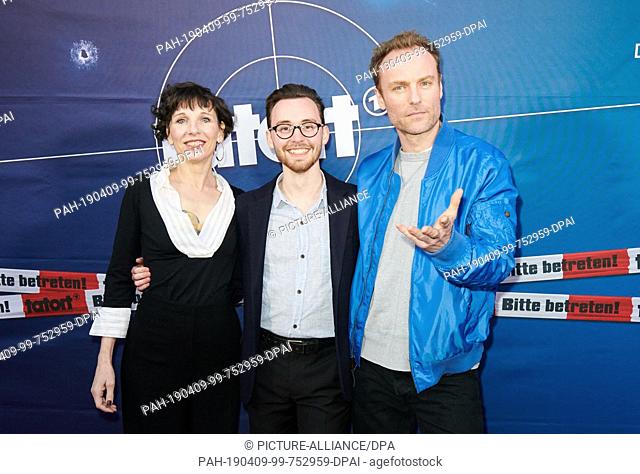 09 April 2019, Berlin: The actors Meret Becker (l-r), Jonas Hämmerle and Mark Waschke are on the red carpet for the premiere of the new ARD crime novel ""Der...