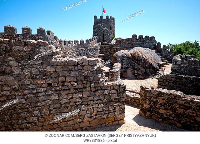 Parapets on the top of curtain walls and solid tower provides the defenders with the safe view over surrounding land. Castle of the Moors. Sintra