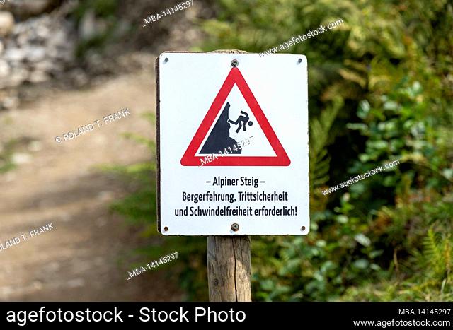 austria, kleinwalsertal, warning sign alpiner steig