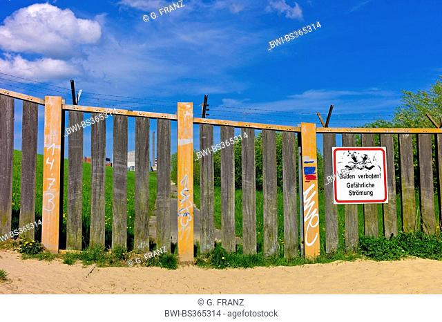 nuclear power station Stade at the Elbe; sign 'bathing forbidden, dangerous current', Germany, Lower Saxony