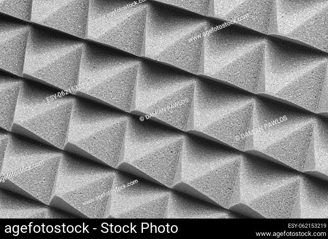 Graphite acoustic foam. Insulating mat with a pyramid structure