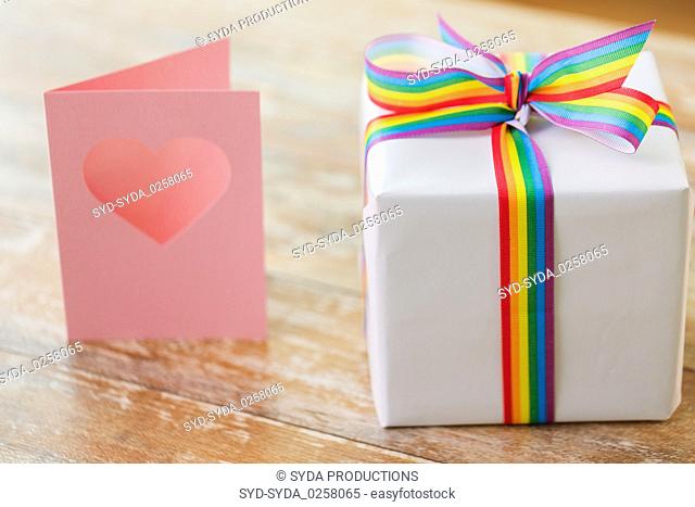 gift with gay awareness ribbon and greeting card