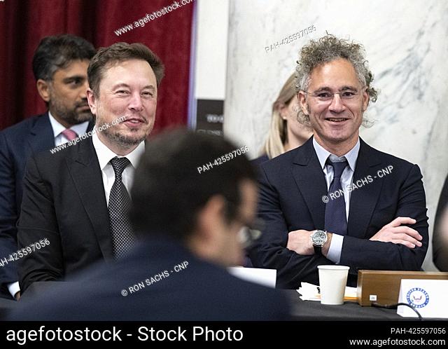 Elon Musk, Chief Executive Officer, Tesla, SpaceX and X (previously known as Twitter), left, and Alex Karp, co-founder and Chief Executive Officer of Palantir