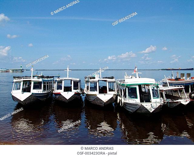 manaus am boats anchored on the water