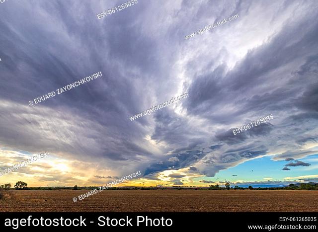Amazing clouds over the fields. Scenic view. Natural background