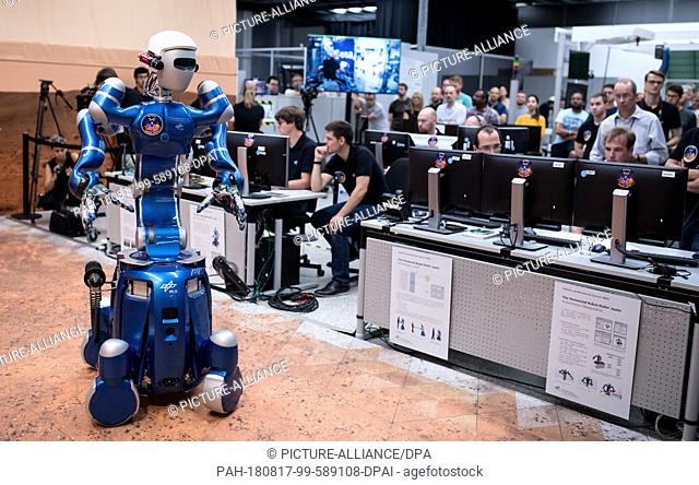 17 August 2018, Germany, Wessling: ESA astronaut Alexander Gerst controls the humanoid robot ""Rollin Justin"" at the German Aerospace Center (DLR) from the ISS