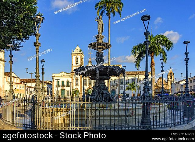 Central square in the historic neighborhood of Pelourinho in Salvador with fountain, houses and churches