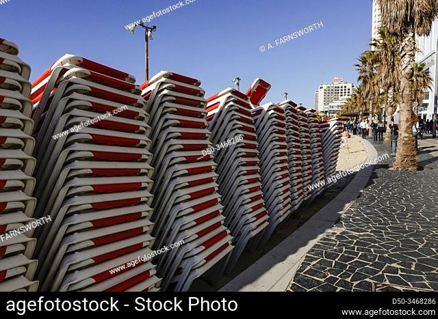 Tel Aviv, Israel Beach chairs lined up on the boardwalk