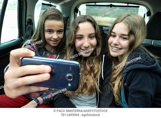 Teen doing a Selfy in the car in Valencia
