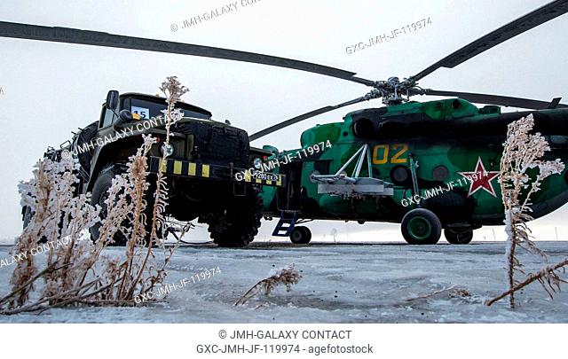 A Search and Rescue helicopter is seen grounded by low visibility at the Arkalyk Airport in Kazakhstan on Saturday, March 16, 2013