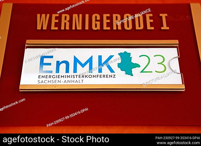 27 September 2023, Saxony-Anhalt, Wernigerode: A sign with the imprint of ENMK 2023 hangs on a door of the conference hotel