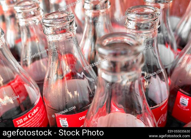 Empty glass bottles of Coca Cola, close-up. View from above. Italy February 19 2019