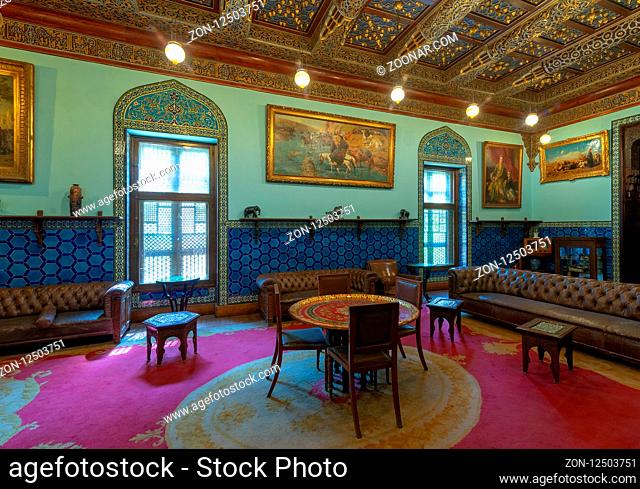 Manial Palace of Prince Mohammed Ali. Living room at the residence building with Turkish floral blue pattern ceramic tiles, vintage furniture