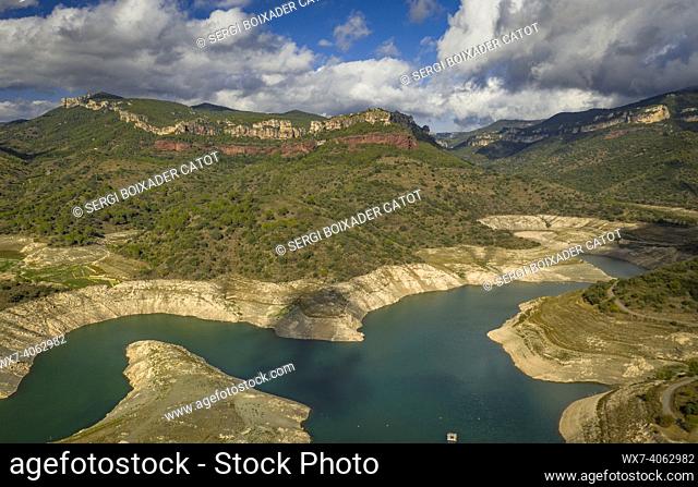 Aerial view of the almost dry PantÃ  de Siurana reservoir during the 2022 drought (Pirorat, Tarragona, Catalonia, Spain)