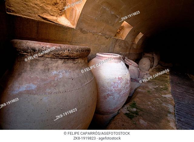 Jars of clay to preserve foods in the cellar  La Mota castle, Alcala la real, Jaen, Spain