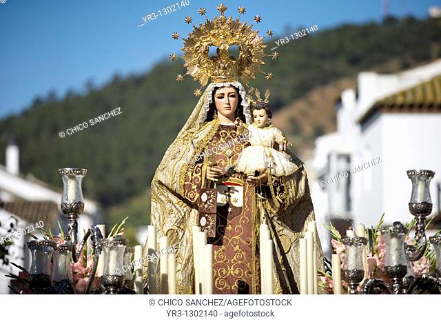 A wooden statue of the Virgin Carmen is publicly displayed during a Holy Week procession in the town of Prado del Rey in southern Spain's Cadiz Sierra region in...