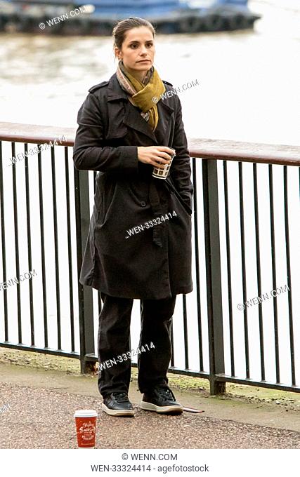 Tom Hardys wife, Charlotte Riley is spotted filming scenes for upcoming drama 'Press' on the banks of the Thames. Featuring: Charlotte Riley Where: London