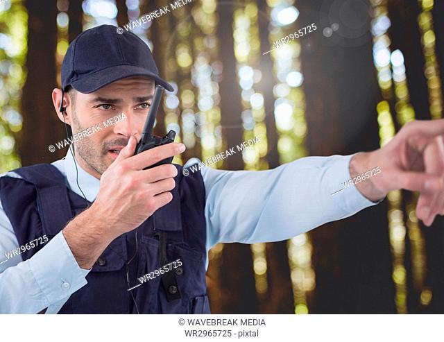 Security man outside in forest