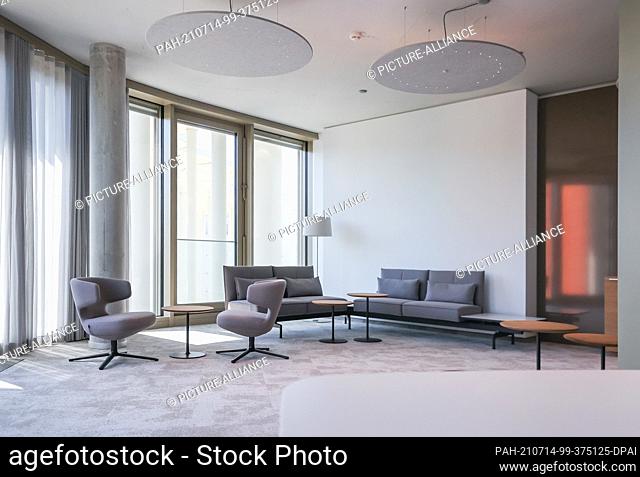 FILED - 17 June 2021, Saxony, Leipzig: A meeting room on the executive level of the Sächsische Aufbaubank (SAB). The architecturally sophisticated building...
