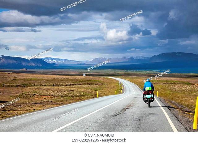 Traveling cyclist in Iceland