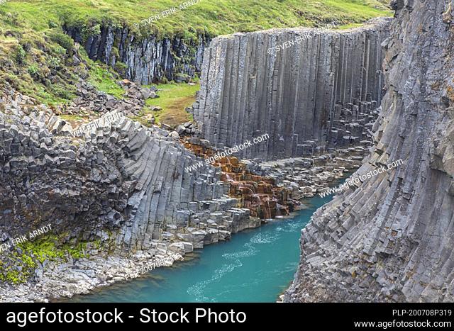 Jökla glacial river and basalt columns, volcanic rock formations at Studlagil / Stuðlagil Canyon, Jökuldalur / Glacier Valley, Austurland, Iceland