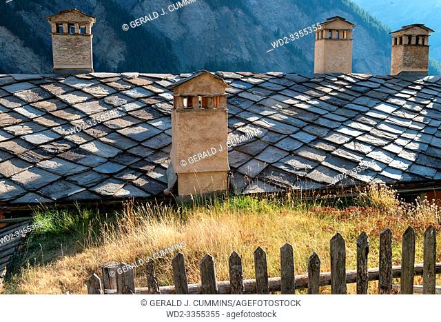 France, Saint-Véran, High Alps, 09/2016 Chimney staks on the roofs in the village of Saint Veran, the highest in France, On the list on the most beautiful...