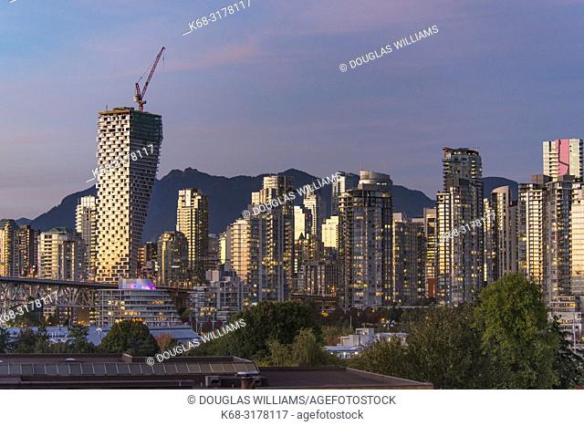 Skyline at twilight, with Vancouver House tower on left, Vancouver, BC, Canada