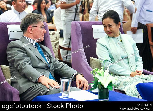 MYANMAR, YANGON - OCTOBER 30, 2023: Russia's Ambassador to Myanmar Iskander Azizov (L) and Myanmar's Union Minister for Hotels and Tourism Thet Thet Khine...