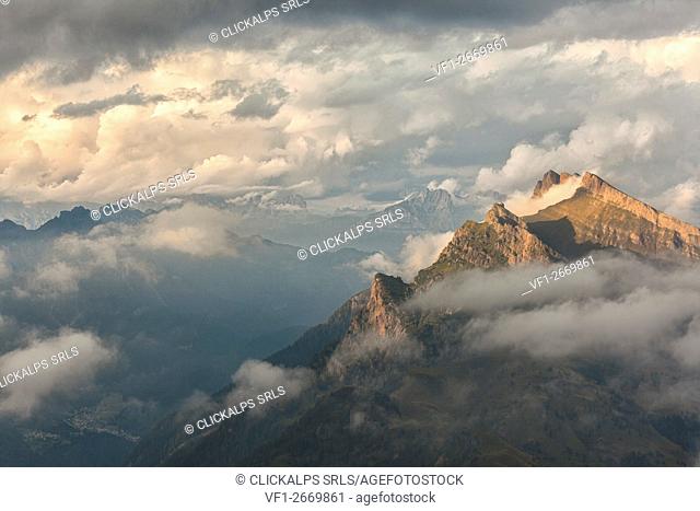 Pale di San Lucano, the green ridge of Vanediei as seen from Campo Boaro in a summer day of clouds and sun, Agordino, Dolomites