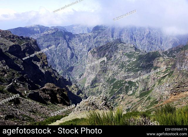 the high mountains at madeira island called pico arieiro, the top is 1818 meters above sea level in the clouds