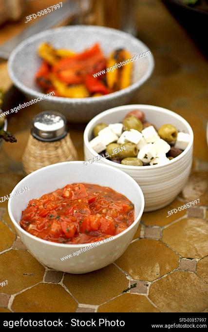 Tomato salsa, olives with feta and barbecued peppers