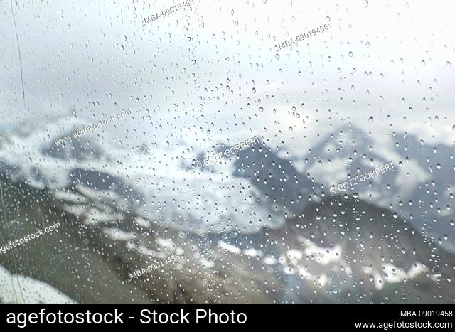 Tracuit mountain hut (3256m), lunch room, view through window
