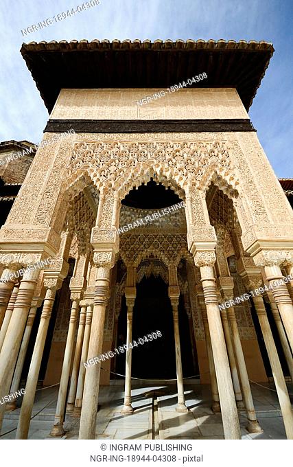 Courtyard of the Lions (El Patio de los Leones) in the Alhambra a moorish mosque, palace and fortress complex in Granada, Spain