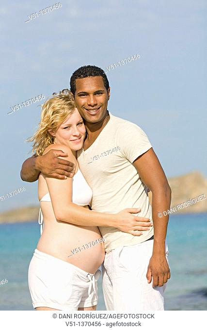 Interracial couple at the beach