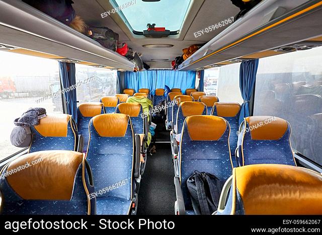 Bus interior empty seats, stop on a long distance trip