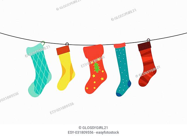 cute colorful hanging christmas socks in line