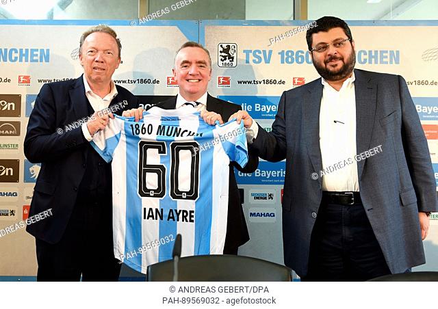President Peter Cassalette (L) and investor Hasan Ismaik (R) of German 2nd Bundesliga soccer club TSV 1860 Munich present new general manager Ian Ayre with a...