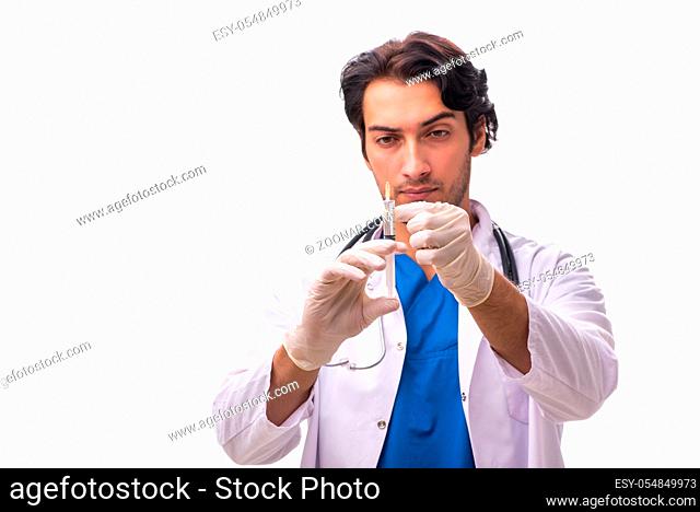 Young handsome doctor isolated on white