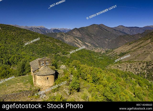 Aerial view of the church of Santa EulÃ lia and the town of Alendo and the Coma de Burg valley with green fields (Pallars SobirÃ , Lleida, Catalonia, Spain