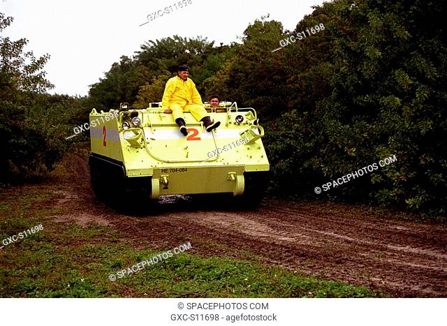 01/09/1998 --- STS-89 Mission Specialist Salizhan Sharipov of the Russian Space Agency drives the M-113 armored personnel carrier as part of Terminal Countdown...