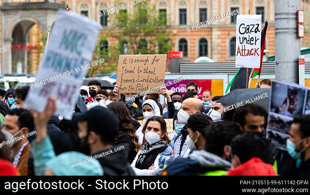 15 May 2021, Lower Saxony, Hanover: Participants of the demonstration of various Palestinian groups walk through the city centre