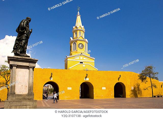 View to the cathedral with clock tower in the historic center with the statue of Pedro De Heredia in the foreground, Cartagena de Indias, Bolivar , Colombia