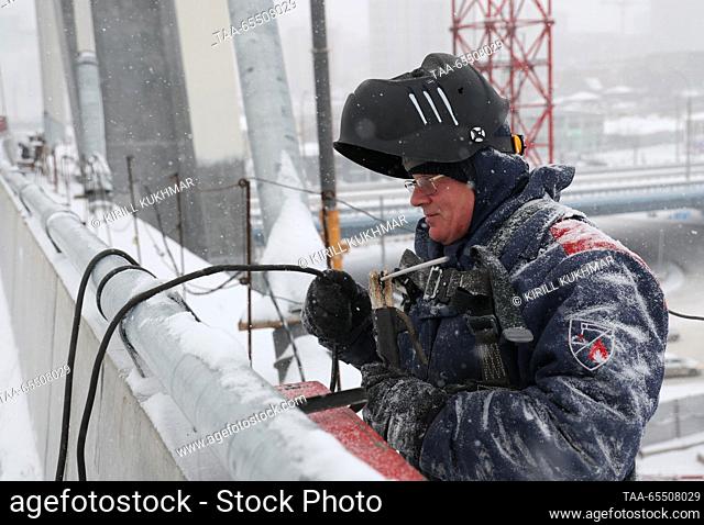 RUSSIA, NOVOSIBIRSK - DECEMBER 6, 2023: A welder is seen during the construction of a cable-stayed bridge over the River Ob; it will be the 4th road bridge over...