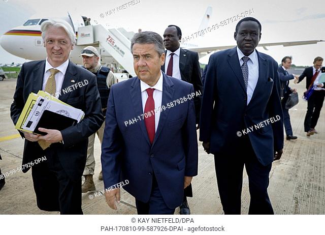 German Foreign Minister Sigmar Gabriel being greeted at the International Airport of Juba by the German Ambassador in South Sudan