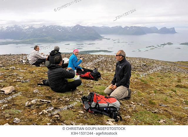 picnic break at the summit of the Husfjellet mountain, Senja island County of Troms, Norway, Northern Europe