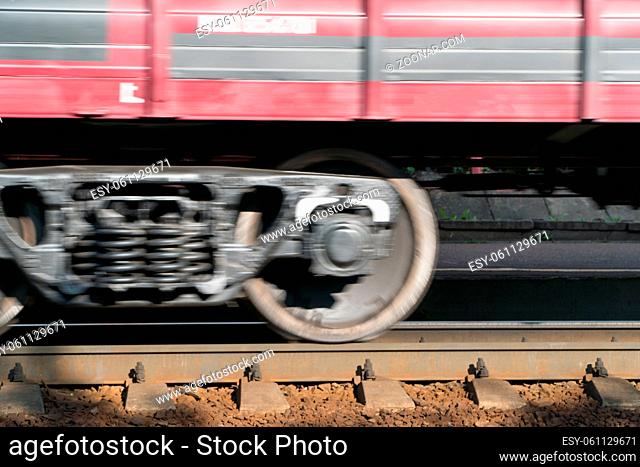 close - up of the train wheel in motion on the railway