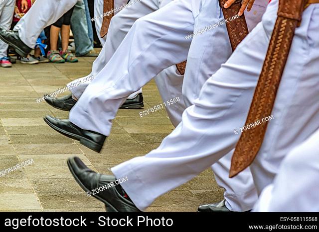Low angle shot of dancers feets with typical costume dancing traditional ecuadorian music at Bucay city, Ecuador