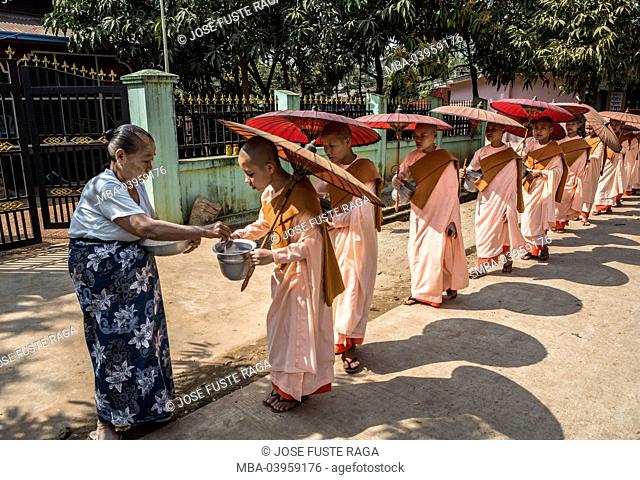 Myanmar, near Yangon, Kyauktan City, Nuns, Parade