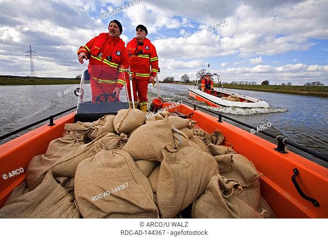 Transport of sandbags river Elbe Dannenberg Lower Saxony Germany inundation
