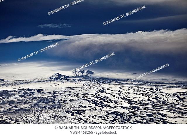 Grimsvotn Volcanic Eruption in the Vatnajokull Glacier, Iceland  Ash seen in the clouds, snow, and ice approx 20-40 kilometers away  The eruption began on May...